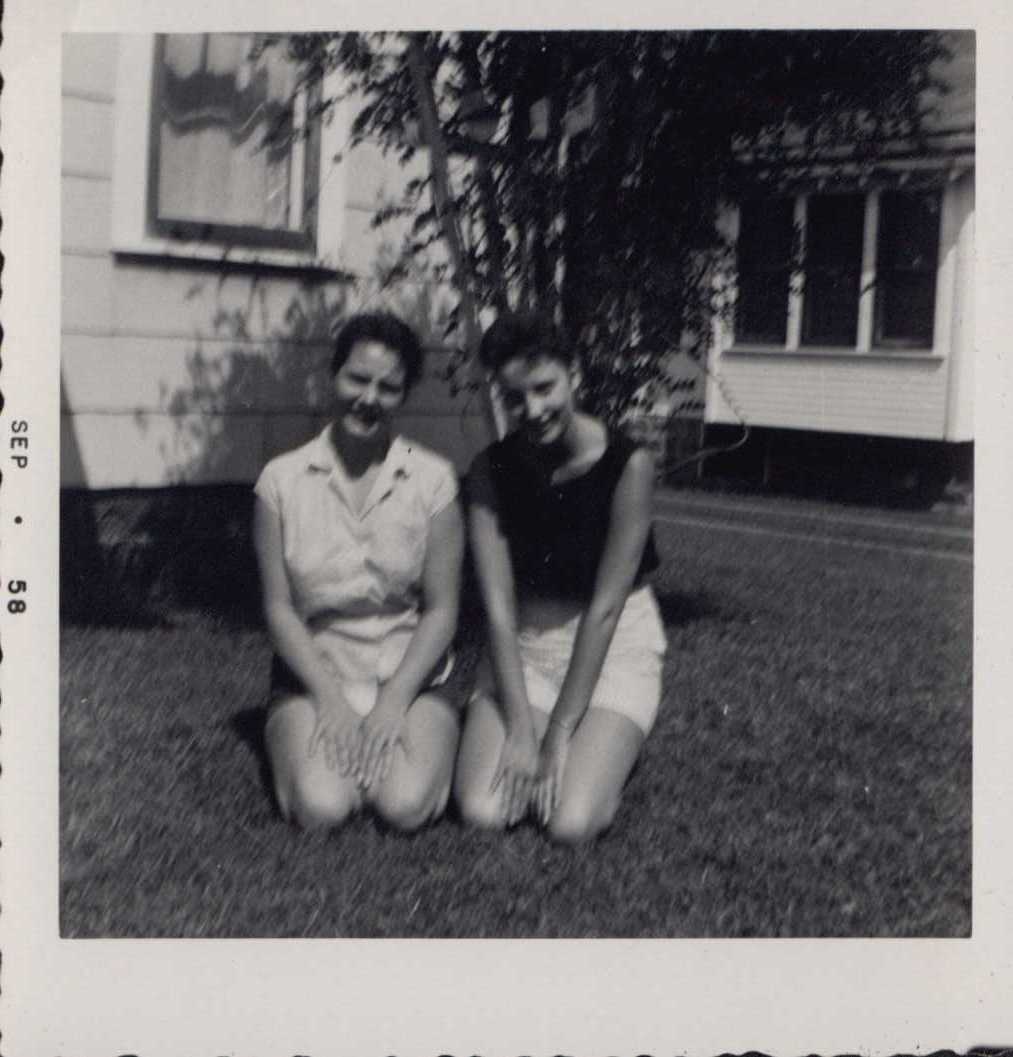 Pictures of Joan and Family with Nina Mae and Family in front of a House, 1958